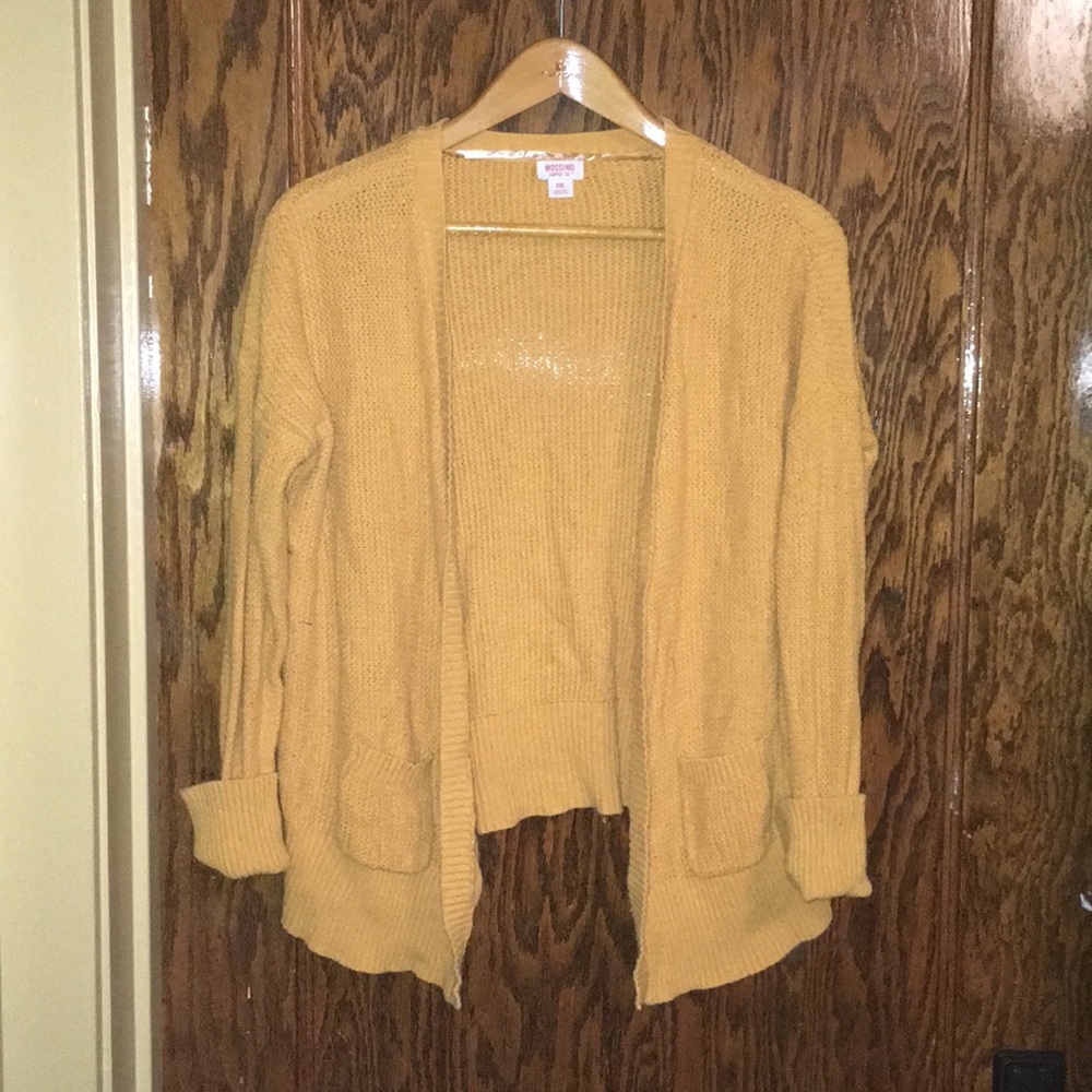 Open cardigan sweater.